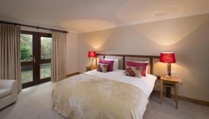 Llit o llits en una habitació de Delphi Resort Hotel & Spa