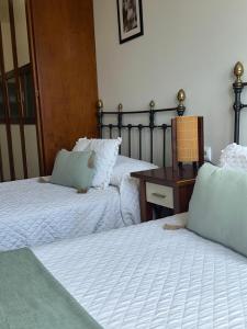 A bed or beds in a room at A CALZADA