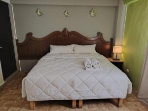 Postel nebo postele na pokoji v ubytování Cabo Tortuga Hotel Boutique