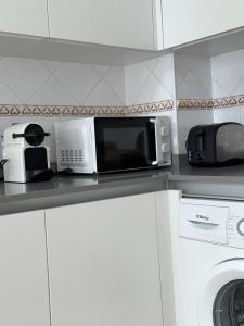 A kitchen or kitchenette at A CALZADA