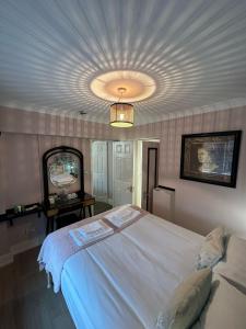 The Cambridge Guest House by Tas客房内的一张或多张床位