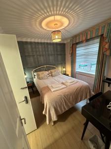 The Cambridge Guest House by Tas客房内的一张或多张床位