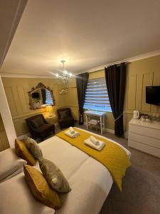 The Cambridge Guest House by Tas客房内的一张或多张床位