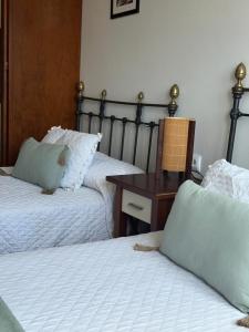 A bed or beds in a room at A CALZADA