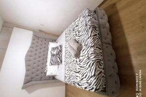 Postel nebo postele na pokoji v ubytování HERMOSO APARTAMENTO EN ZONA TRANQUILA , Beautiful Apartament with Amenties Quiet area