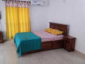 Ένα ή περισσότερα κρεβάτια σε δωμάτιο στο Studio and One bedroom Apartment in Riviera Sapphire, Siolim