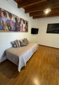 Postel nebo postele na pokoji v ubytování Departamento cerca de Parque San Martín