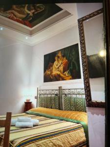 Tempat tidur dalam kamar di Sancta Scala