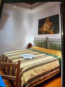 Tempat tidur dalam kamar di Sancta Scala