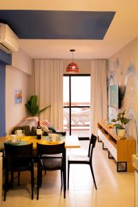 Et opholdsområde på Apto Ibiza Praia & Piscina - Conforto e Estilo