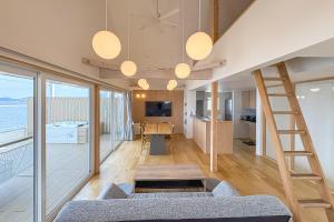 TV a/nebo společenská místnost v ubytování Beach SPA TSUDA 1 Uno