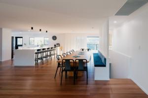 a dining room and kitchen with a table and chairs at Monty's House in Montville +39 photos