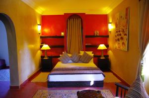 Postel nebo postele na pokoji v ubytování Essaouira Lodge