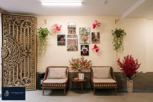 Khu vực ghế ngồi tại High-ser Apt w Greenview, Projector and 2BR incenter - So warmly and spacious