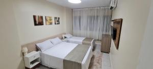 Katil atau katil-katil dalam bilik di Flat com Vista Teatro Amazonas +4 gambar