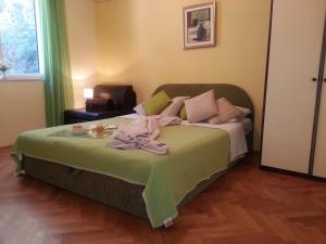 Postel nebo postele na pokoji v ubytování Dubrovnik Residence Nodilo