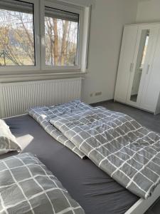 Ένα ή περισσότερα κρεβάτια σε δωμάτιο στο Apartment Panoramablick