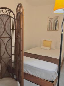 a couple of bunk beds in a room with a lamp at E-Place Resort in Magallanes +8 photos