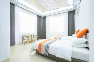 Meizhou Island Zhengxinju Homestay客房内的一张或多张床位
