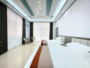 Meizhou Island Zhengxinju Homestay客房内的一张或多张床位