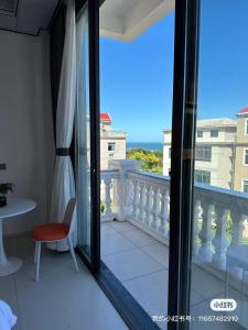 Meizhou Island Zhengxinju Homestay的阳台或露台