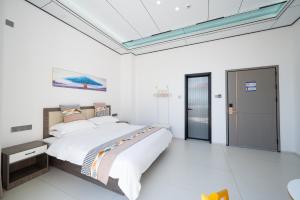 Meizhou Island Zhengxinju Homestay客房内的一张或多张床位
