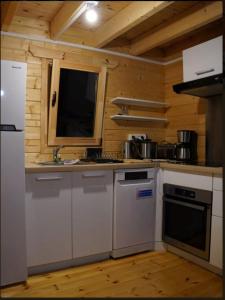 Kuchyň nebo kuchyňský kout v ubytování Les 3 Chalets de Cilaos + 12 fotografií
