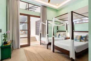 Postel nebo postele na pokoji v ubytování Ban Laem Set - by Sublime Samui Villas