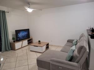 TV i/ili multimedijalni sistem u objektu Villa Lé fé péi 3 étoiles