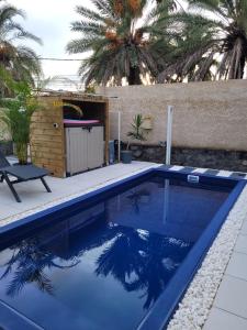 Bazen u ili blizu objekta Villa Lé fé péi 3 étoiles