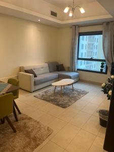 Istumisnurk majutusasutuses Waterfront comfort appartmentشقة بانوراما إطلاله على البحيرة