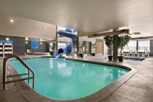 The swimming pool at or close to Days Inn by Wyndham Regina