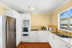 Η κουζίνα ή μικρή κουζίνα στο Gerroa House