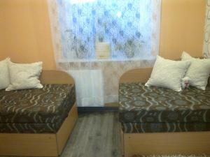 En eller flere senge i et værelse på LD apartamenti