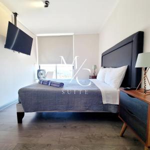 Postel nebo postele na pokoji v ubytování Exclusivos Departamentos. Vista al mar, cocina, lavadora, terraza, wifi, TV Smart, toallas y parking.