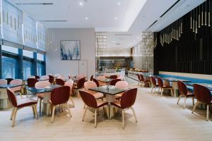 Restavracija oz. druge možnosti za prehrano v nastanitvi Wuhan Hazens Hotel