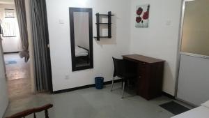 Ένα ή περισσότερα κρεβάτια σε δωμάτιο στο Melbourne Homestay