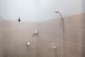 Ένα μπάνιο στο DMY Guest House Nusa Penida