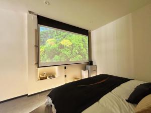 Легло или легла в стая в Yish Cinema Serviced Apartment B&B