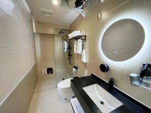 Баня в Yish Cinema Serviced Apartment B&B