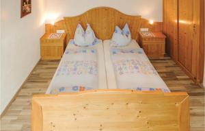 Łóżko lub łóżka w pokoju w obiekcie Ferienwohnung In Aschau