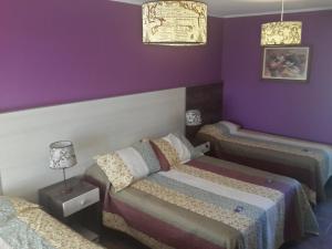 A bed or beds in a room at Altos de Adonai