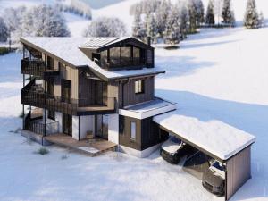 Bergzeit flat Saalbach directly on the ski piste v zime