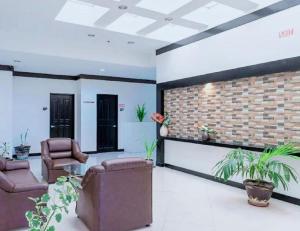 Posezení v ubytování Check Inn Hotel Dumaguete City by RedDoorz
