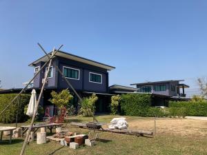 Zahrada ubytování บ้านฮิมฝั่งแกนแฟมิลี่