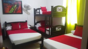 Voodi või voodid majutusasutuse Hotel Colonial toas