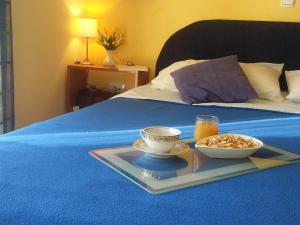 Postel nebo postele na pokoji v ubytování Dubrovnik Residence Nodilo