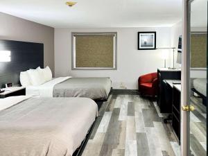 Voodi või voodid majutusasutuse Quality Inn Raynham - Taunton toas