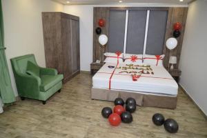 Postel nebo postele na pokoji v ubytování فندق سويت لافندر Lavender Suite Hotel