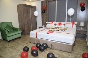 Postel nebo postele na pokoji v ubytování فندق سويت لافندر Lavender Suite Hotel